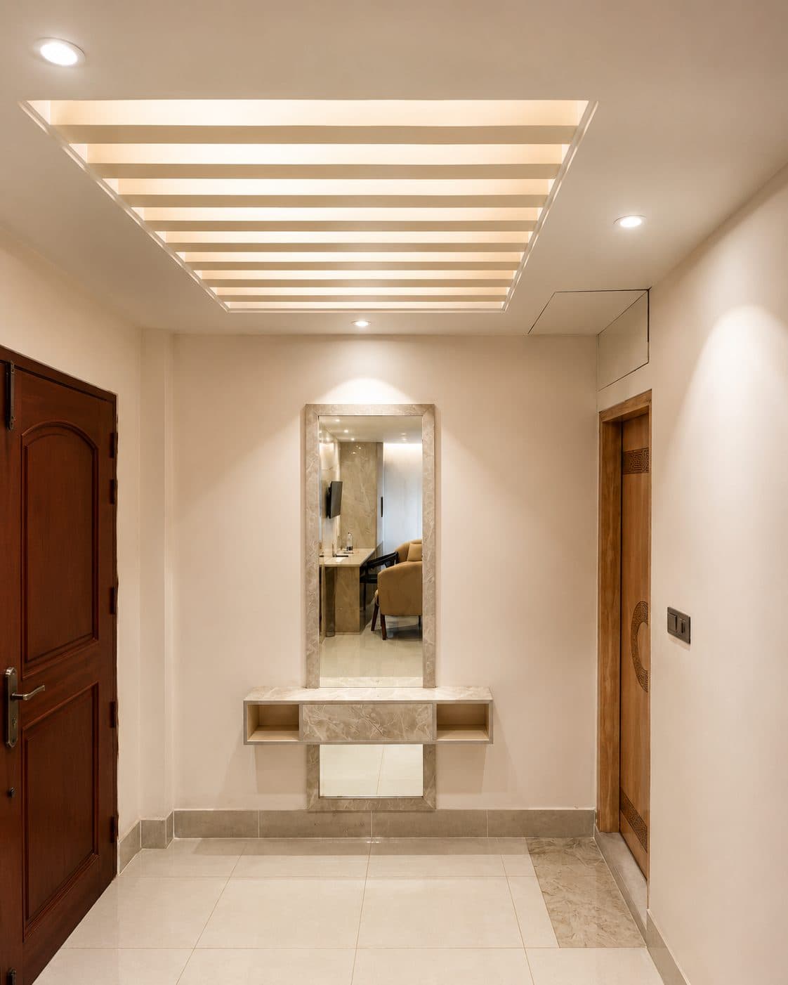 Arrival foyer with a backlit dressing mirror
